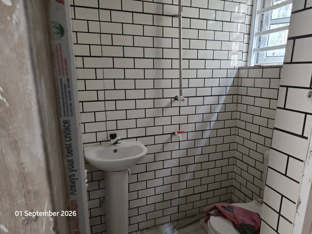 Side view of the bathroom at Achievers Dorms
