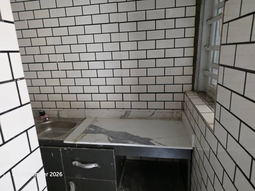 Another view of the kitchen area at Achievers Dorms
